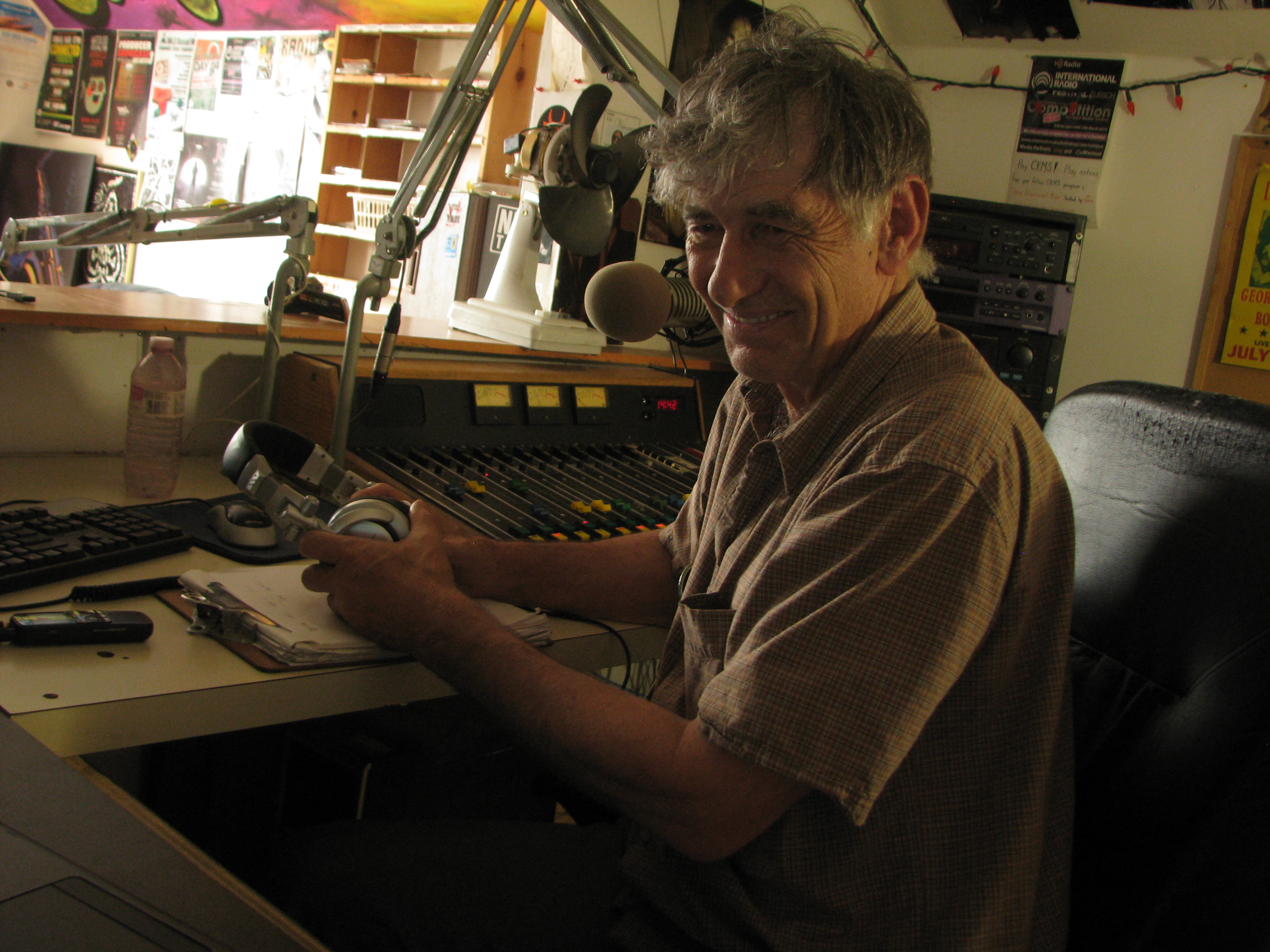 Jeff Stager in the control booth of SoundFM